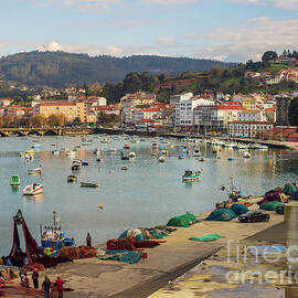 Fishermen Repairing Nets on the Beautiful Fishing Town of Pontedeume La Coruna Galicia