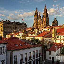 Santiago de Compostela Cathedral Spectacular View with Sun Light Hitting the facade and Tiled Roofs La Corua Galicia